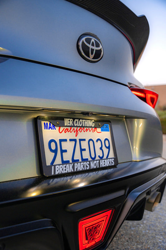 License plate frame (I BREAK PARTS NOT HEARTS)